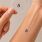 Applying a Berberine Boost topical patch to the forearm