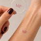 Applying a Menopause topical patch to the forearm